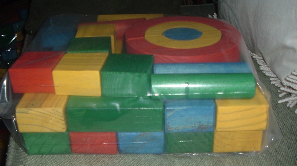 54 different shaped blocks .  also available in a wooden box