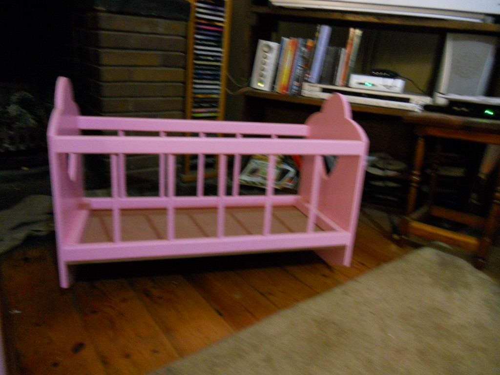 Rocking cot in pink